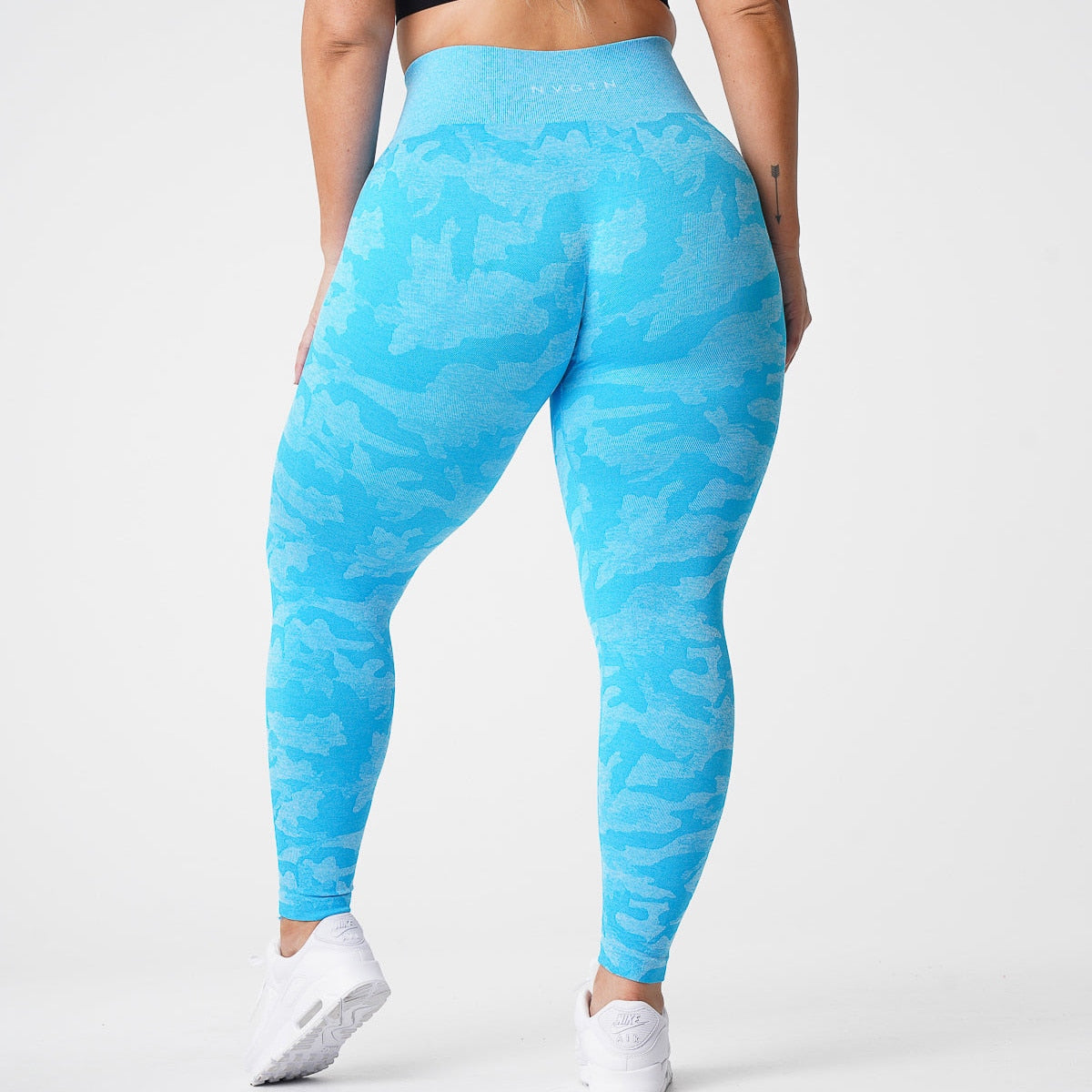 Curvy CAMO Women activewear.  Seamless, High Waisted, and comfortable fit leggings. Made to stretch and comes in different colors. - twobusybodies