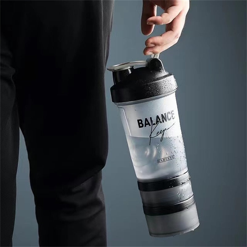 500ML Shaker Bottle. Mixing Bottle good for Sports, Fitness, and Gym. Even has storage for taking the mix on the go. - twobusybodies